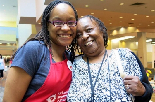 Rev. Ayanna Johnson Watkins, Director of the NBA Incubate Initiative, with Pastor Milele Hobbs at the 2015 General Assembly.