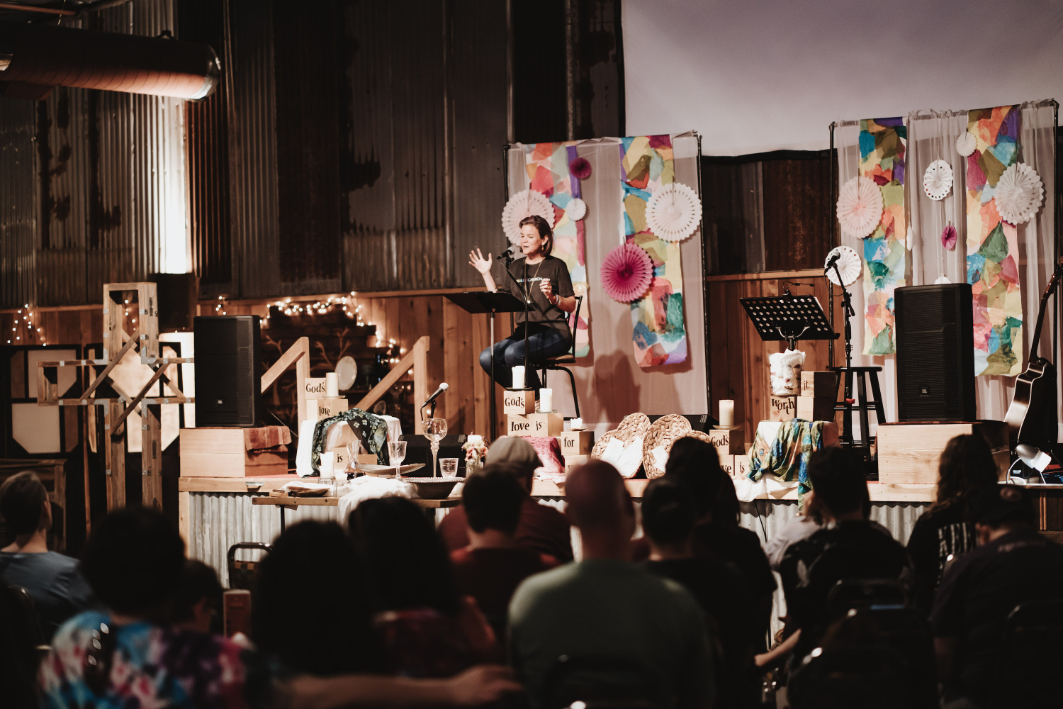 Rev. Dr. Katie Hays preaching at a Galileo Church service pre-pandemic.