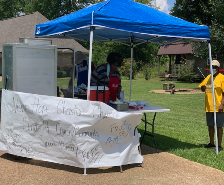 Sign reads: New Hope Christian Church COVID-19 Church/Community Support Ministry. Free BBQ!